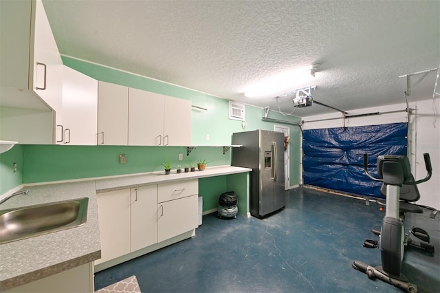 6416 Cobble Bliss St, Zephyrhills, FL 33541 - interior space with a sink, stainless steel refrigerator with ice dispenser, and a garage door opener