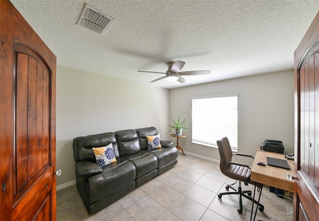 6416 Cobble Bliss St, Zephyrhills, FL 33541 - office with light tile patterned flooring, baseboards, ceiling fan, and visible vents