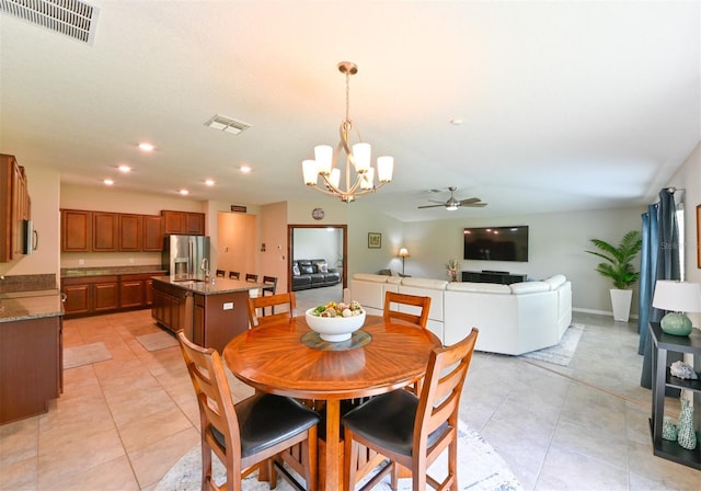 6416 Cobble Bliss St, Zephyrhills, FL 33541 - dining space with light tile patterned flooring, visible vents, and ceiling fan with notable chandelier