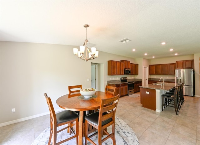 6416 Cobble Bliss St, Zephyrhills, FL 33541 - dining space with recessed lighting, light tile patterned floors, baseboards, visible vents, and a notable chandelier