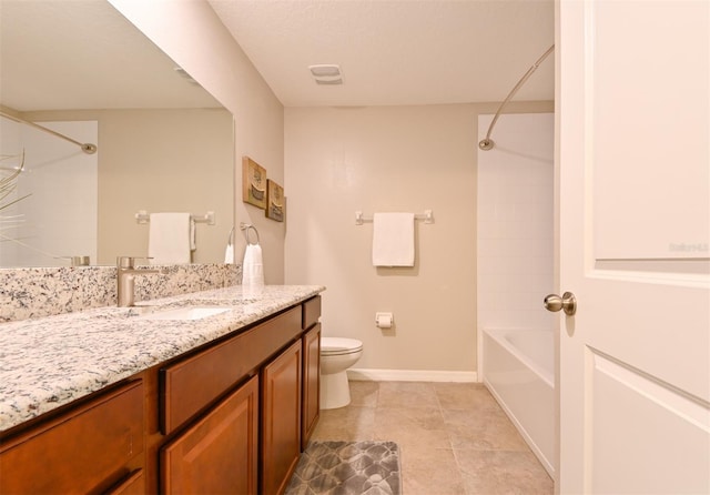 6416 Cobble Bliss St, Zephyrhills, FL 33541 - bathroom with vanity, toilet, baseboards, tile patterned floors, and shower / bathtub combination