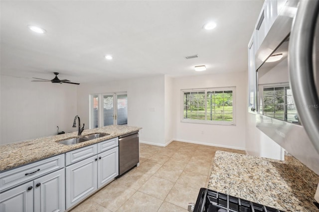 1308 W Perdiz St, Tampa, FL 33612 - kitchen featuring a sink, light tile patterned flooring, recessed lighting, a ceiling fan, and dishwasher