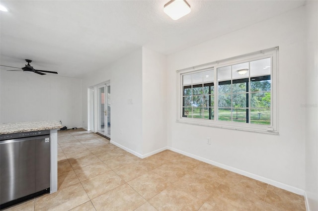 1308 W Perdiz St, Tampa, FL 33612 - spare room featuring ceiling fan, baseboards, and light tile patterned flooring