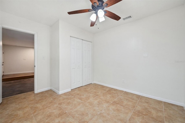 1308 W Perdiz St, Tampa, FL 33612 - unfurnished bedroom featuring ceiling fan, baseboards, visible vents, and a closet