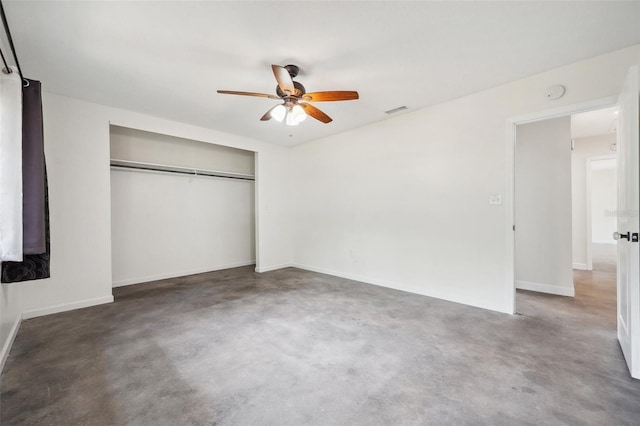 1308 W Perdiz St, Tampa, FL 33612 - unfurnished bedroom with baseboards, visible vents, finished concrete flooring, and a closet