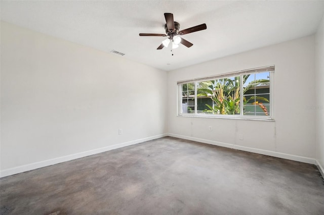 1308 W Perdiz St, Tampa, FL 33612 - empty room featuring baseboards, visible vents, finished concrete flooring, and ceiling fan