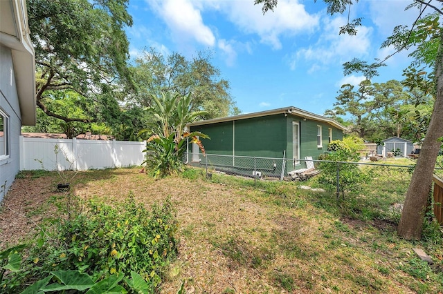 1308 W Perdiz St, Tampa, FL 33612 - view of yard featuring a fenced backyard