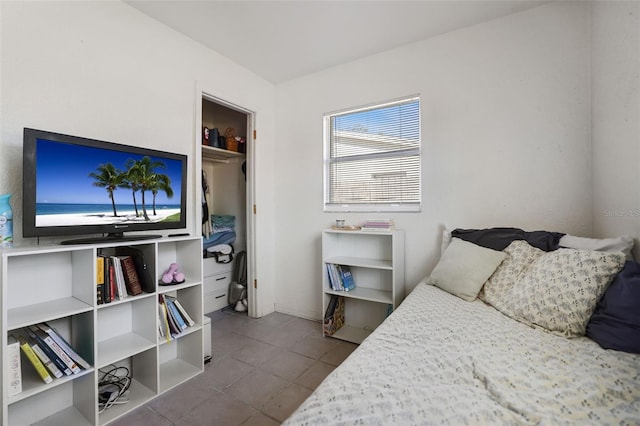 bedroom featuring tile patterned flooring