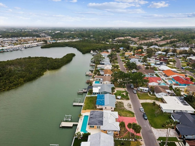 aerial view with a water view and a residential view