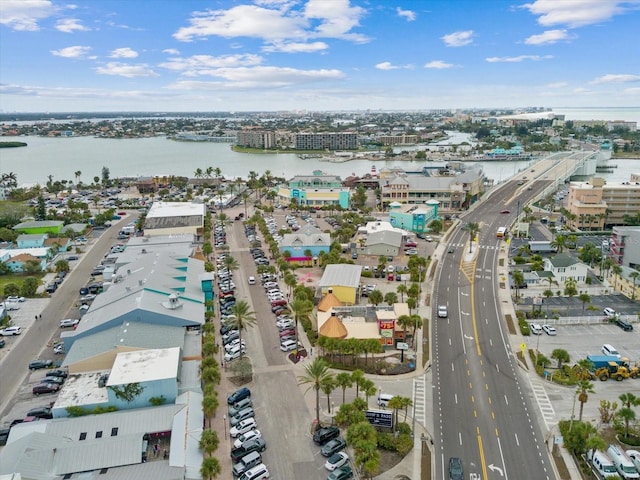 birds eye view of property with a city view and a water view