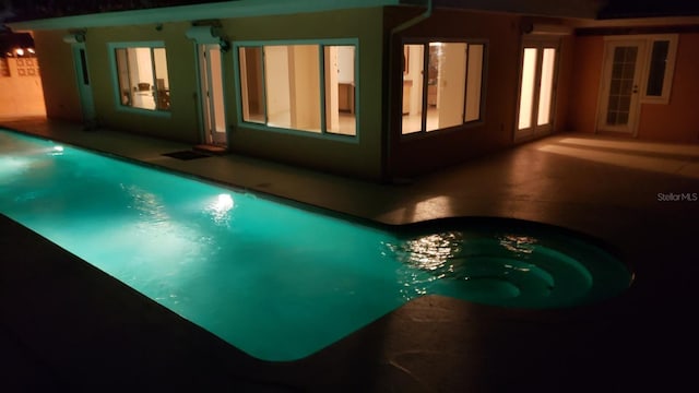 pool with a patio