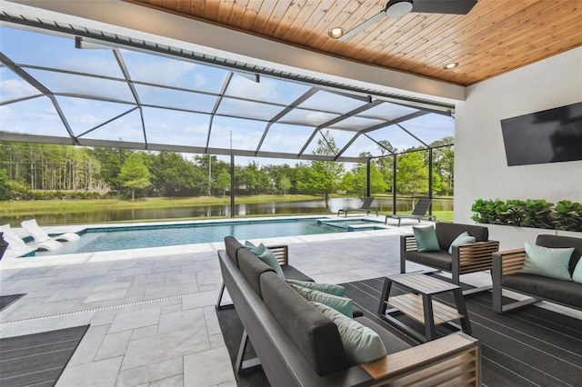 view of pool with a ceiling fan, a patio area, a lanai, an outdoor hangout area, and a pool with connected hot tub