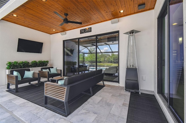 view of patio featuring ceiling fan and an outdoor hangout area
