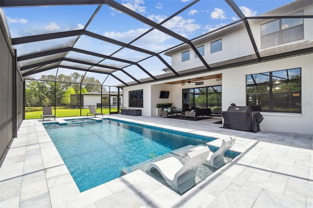 view of swimming pool with a patio area, outdoor lounge area, glass enclosure, and area for grilling