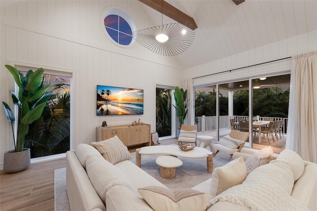 311 Spring Ave, Anna Maria, FL 34216 - living area with lofted ceiling and wood finished floors