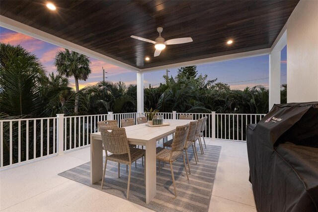 311 Spring Ave, Anna Maria, FL 34216 - view of patio featuring a grill, outdoor dining area, and a ceiling fan