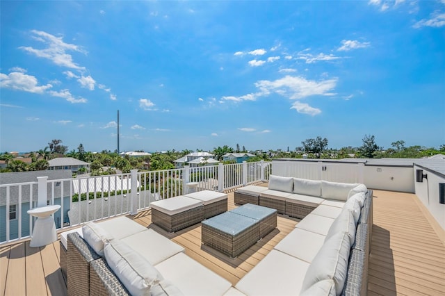 311 Spring Ave, Anna Maria, FL 34216 - wooden terrace with an outdoor living space