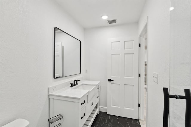 bathroom featuring visible vents, marble finish floor, and vanity