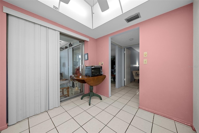 interior space with visible vents and light tile patterned floors