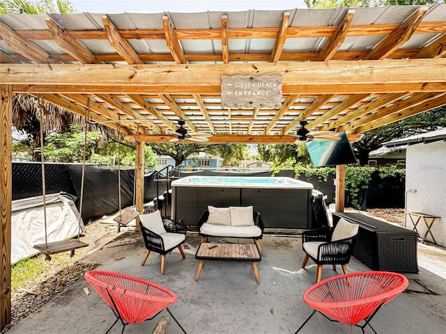 1515 E 31st Ave, Tampa, FL 33610 - view of patio with a ceiling fan, an outdoor living space, and a hot tub