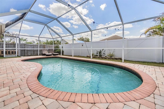 1419 Trail Boss Ln, Brandon, FL 33511 - view of swimming pool with a fenced backyard, a patio, and a lanai