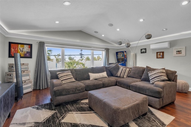 living room featuring dark wood-style flooring, a wall unit AC, vaulted ceiling, and recessed lighting