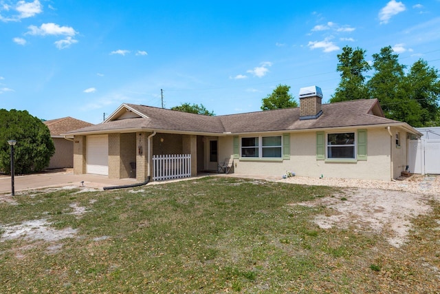 6831 Greenwich Ave, New Port Richey, FL 34653 - ranch-style home with fence, a chimney, a garage, a front yard, and driveway