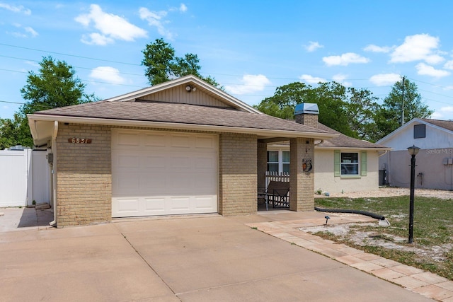 6831 Greenwich Ave, New Port Richey, FL 34653 - ranch-style house featuring roof with shingles, concrete driveway, a chimney, fence, and brick siding