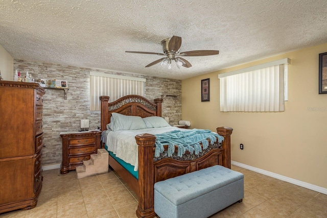 6831 Greenwich Ave, New Port Richey, FL 34653 - bedroom with light tile patterned floors, a textured ceiling, multiple windows, and a ceiling fan