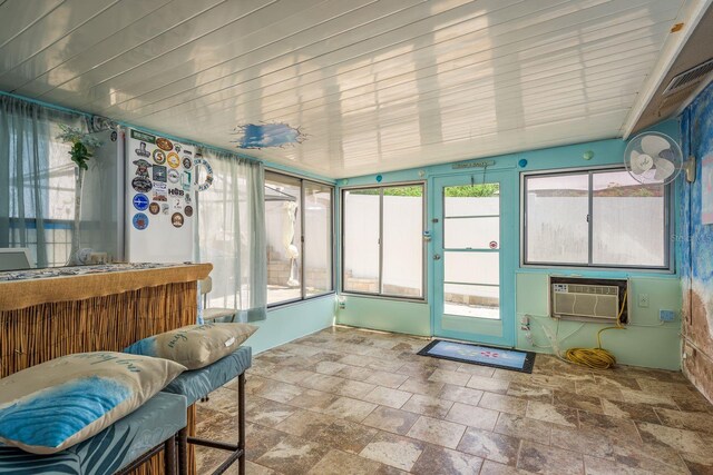 6831 Greenwich Ave, New Port Richey, FL 34653 - sunroom with an AC wall unit