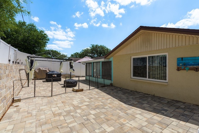 6831 Greenwich Ave, New Port Richey, FL 34653 - view of patio with a fenced backyard and a gazebo