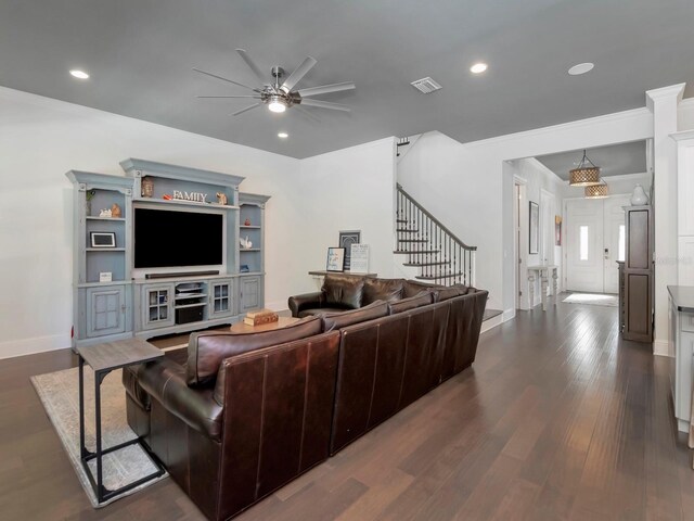 150 Chippewa Ave, Tampa, FL 33606 - living room with stairs, a ceiling fan, baseboards, visible vents, and dark wood-type flooring