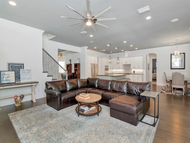 150 Chippewa Ave, Tampa, FL 33606 - living area with visible vents, recessed lighting, a ceiling fan, arched walkways, and dark wood-style floors