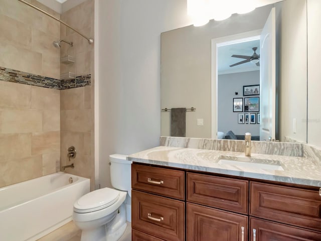 150 Chippewa Ave, Tampa, FL 33606 - ensuite bathroom featuring vanity, crown molding, toilet, tub / shower combination, and a ceiling fan