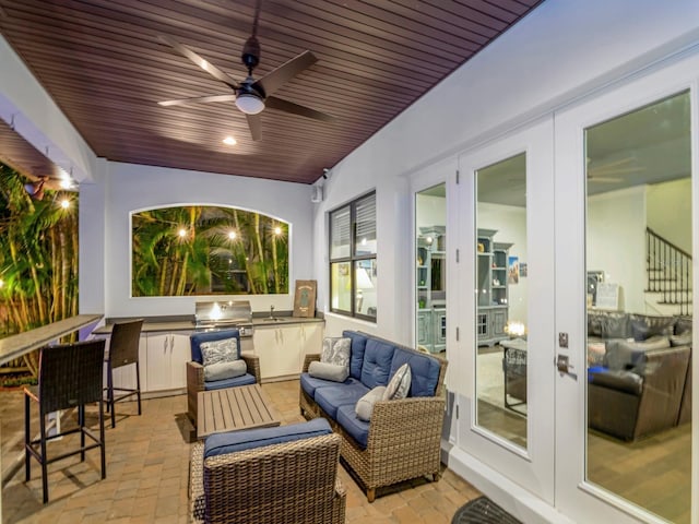 150 Chippewa Ave, Tampa, FL 33606 - view of patio / terrace featuring exterior kitchen, ceiling fan, grilling area, outdoor lounge area, and french doors