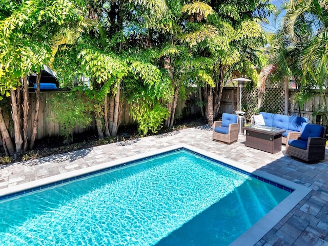 150 Chippewa Ave, Tampa, FL 33606 - view of pool with a fenced backyard, a fenced in pool, an outdoor hangout area, and a patio