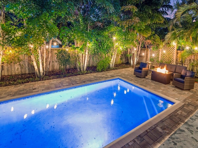 150 Chippewa Ave, Tampa, FL 33606 - view of pool with a fire pit, a fenced backyard, a fenced in pool, and a patio area