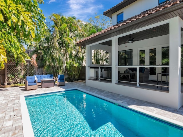 150 Chippewa Ave, Tampa, FL 33606 - view of swimming pool with fence, an outdoor living space, a fenced in pool, ceiling fan, and a patio area