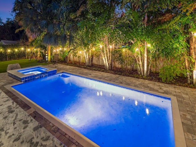 150 Chippewa Ave, Tampa, FL 33606 - view of pool featuring a fenced backyard and a pool with connected hot tub