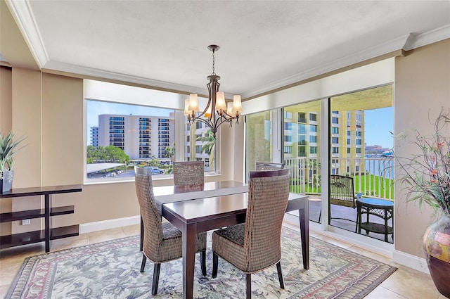 dining room with ornamental molding, a notable chandelier, light tile patterned floors, and a healthy amount of sunlight