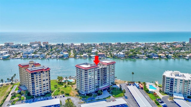 birds eye view of property featuring a water view