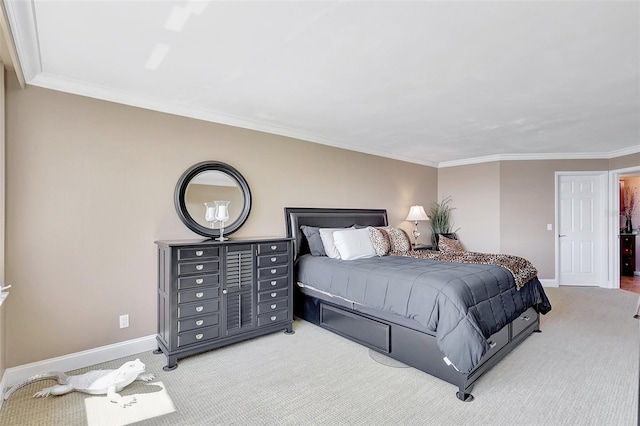 bedroom featuring baseboards, ornamental molding, and light carpet