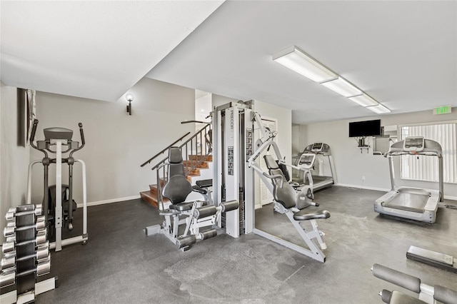 exercise room with baseboards