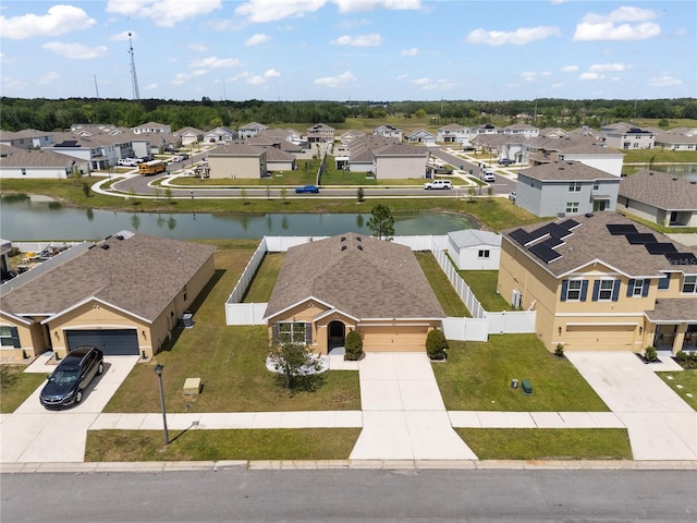 aerial view with a water view and a residential view