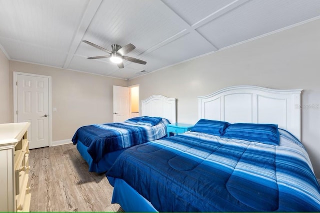bedroom with baseboards, ceiling fan, visible vents, and light wood-type flooring