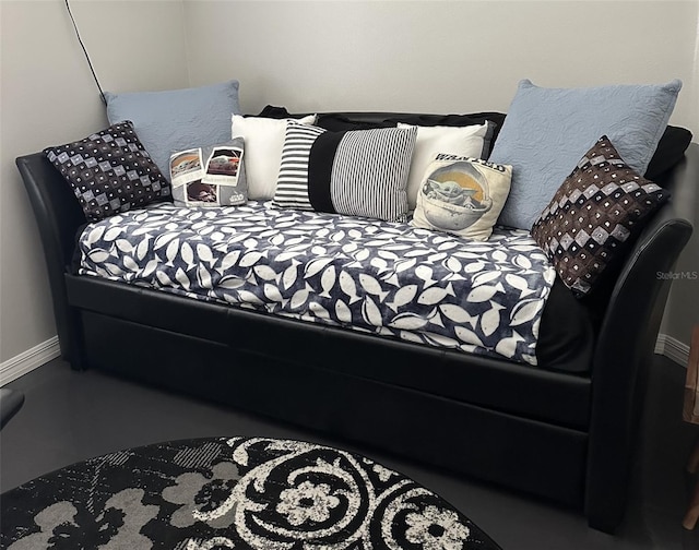 bedroom featuring baseboards