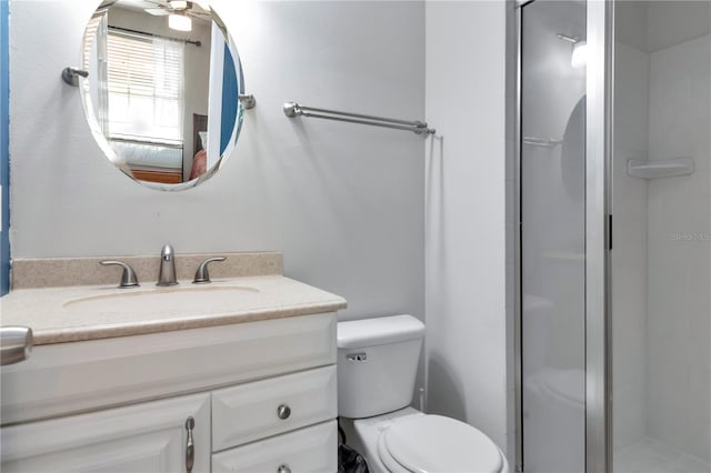 14053 Notreville Way, Tampa, FL 33624 - bathroom with a stall shower, toilet, and vanity
