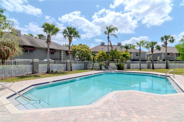 14053 Notreville Way, Tampa, FL 33624 - community pool featuring a residential view and fence