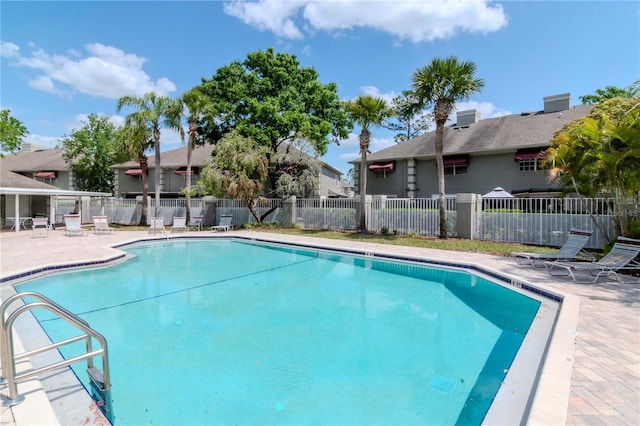 14053 Notreville Way, Tampa, FL 33624 - pool featuring fence and a patio