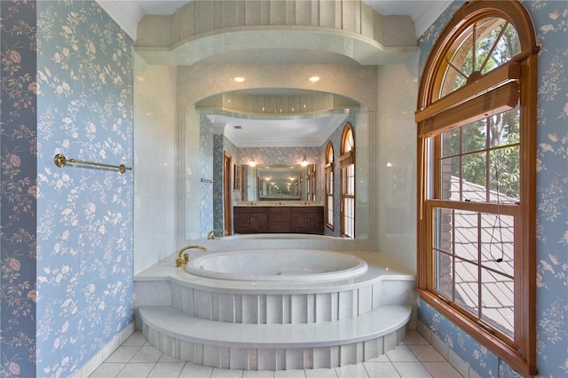 bathroom with ornamental molding, tile patterned floors, vanity, and a bath